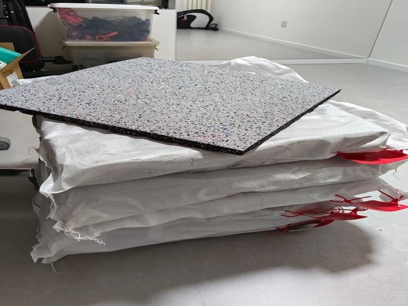 Rubber flooring rolls and tiles